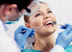 A woman receives a dental treatment