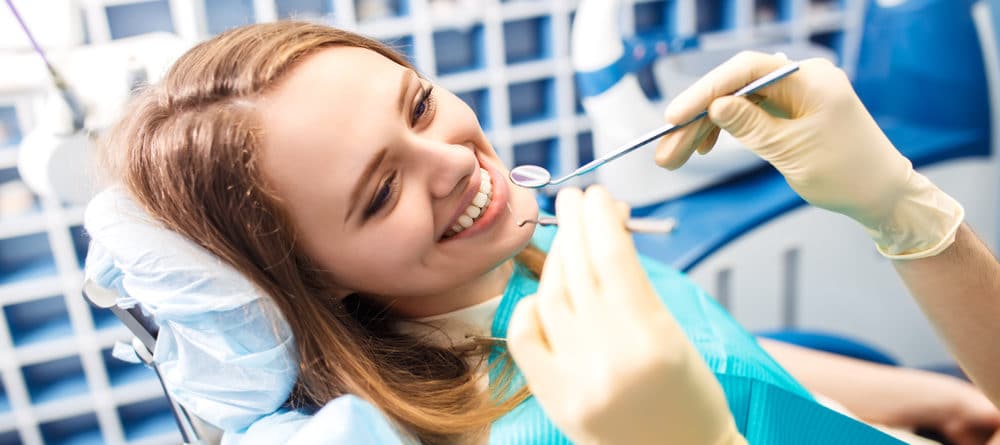 young woman in the dental chair
